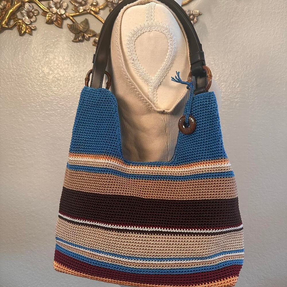 Hand crocheted striped shoulder bag by Sak
